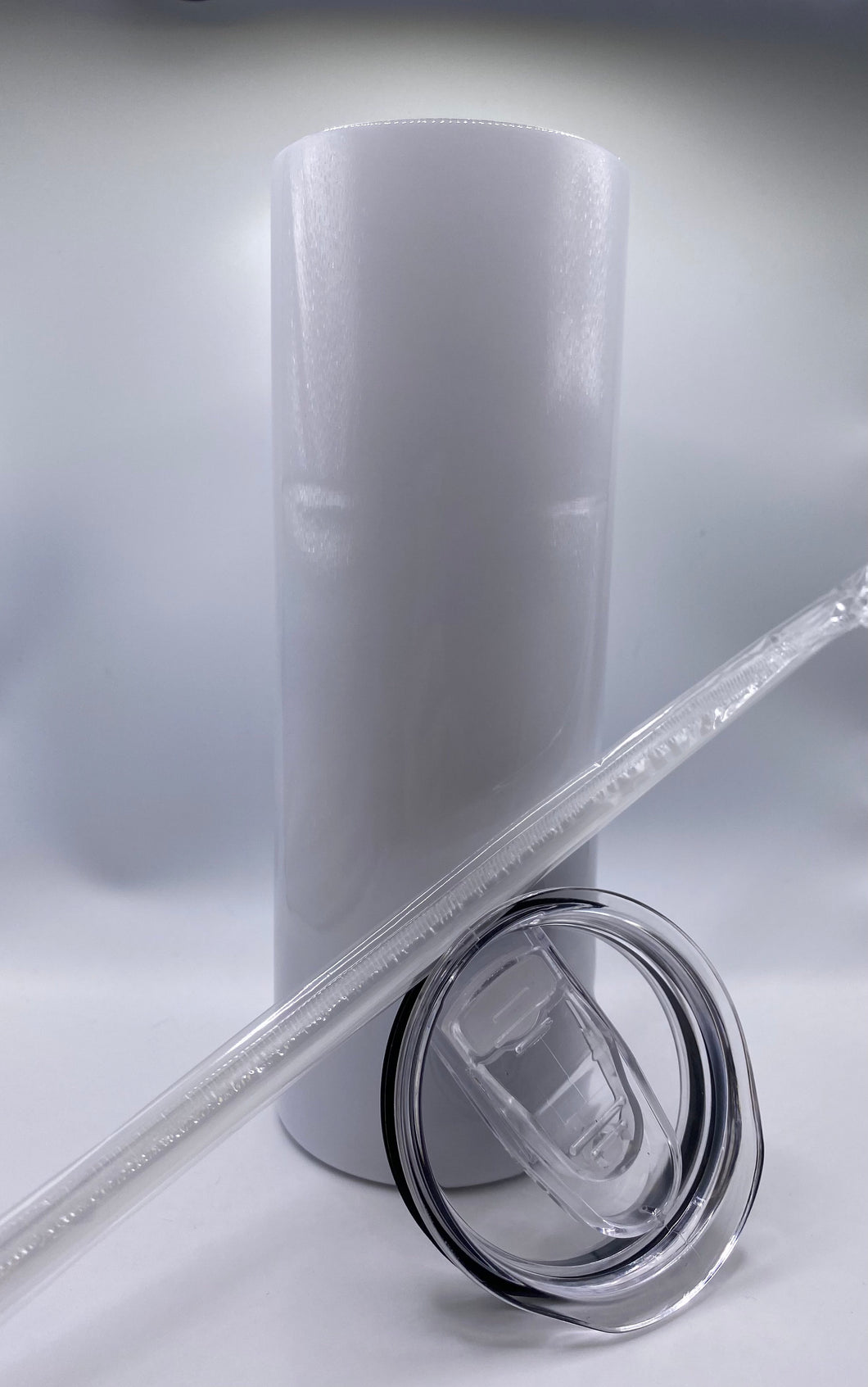 20 oz BLANK SUBLIMATION SKINNY STAINLESS STEEL TUMBLER WITH LID AND PLASTIC STRAW.