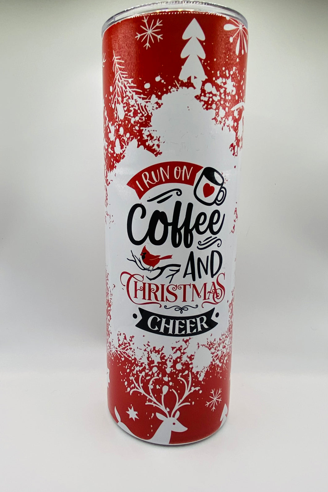 I run on Coffee and Christmas Cheer -  20 oz Stainless Steel Tumbler with lid and straw.
